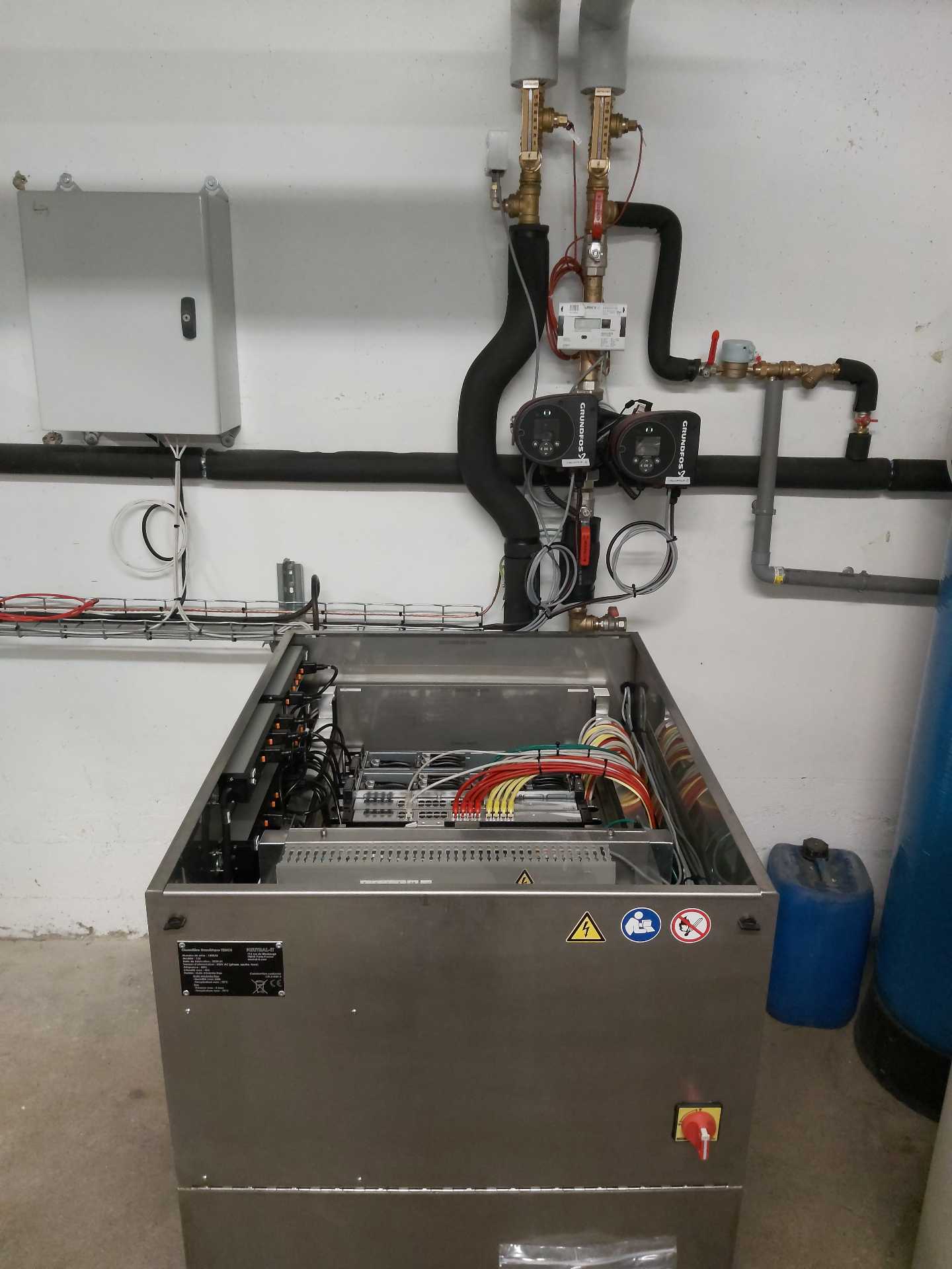 Chauffer l'eau chaude sanitaire des immeubles grâce à des data centers ...