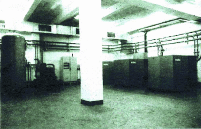 This photograph shows a printing plant for a French national daily newspaper. The plant comprises 3 water-cooled screw compressors, with refrigerator dryer and vertical tank. The static cabinet contains a PLC and remote monitoring to its 24-hour on-call PC.