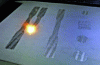 Figure 2 - Effect of the laser on the powder layer
