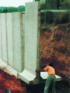 Figure 38 - Installation of a T-shaped retaining wall