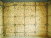Figure 85 - Laying the mesh inside a building (Photo Sismas Srl)
