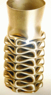 Figure 44 - Hexagonal section tube made of austenitic stainless steel type X5CrNi18-10/1.4301 that has undergone "controlled" buckling. The multiple folds demonstrate the energy absorption capacity of this type of product.