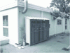 Figure 3 - Compressed gas cylinders under an outdoor mesh canopy