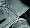 Figure 5 - A simple system for applying modified starch glue to the edges of paper sheets to make multiple bags (source: National Starch).