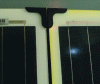Figure 13 - Yellowing of the edges of the right module compared to the left reference module following 3,000 hours of exposure to heat and humidity (85 °C and 85% humidity)