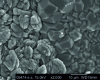 Figure 10 - SEM image of hydrated calcium silicates (left) and zeolites (right) formed during the weathering of SON68 glass, 550 days in initially pure water, 165°C and S/V = 2,000 cm–1(from [9])
