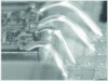 Figure 23 - Bare chip on thick-film hybrid, robustified
using the Isobar process (Matra Cap Systèmes doc.)