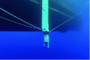 Figure 13 - USBL transducer (GAPS) mounted on a pivoting pole on the side of a ship, with the hull visible in the background. Once the boom is lowered into the water, its ends are extended towards the bow and stern of the boat to stabilize it. During navigation, the pole is raised out of the water (credit: Frédéric Osada, DRASSM – Images Explorations).