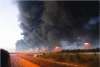 Figure 8 - Inversion layer and horizontal smoke dispersion, Buncefield oil depot fire, December 11, 2005